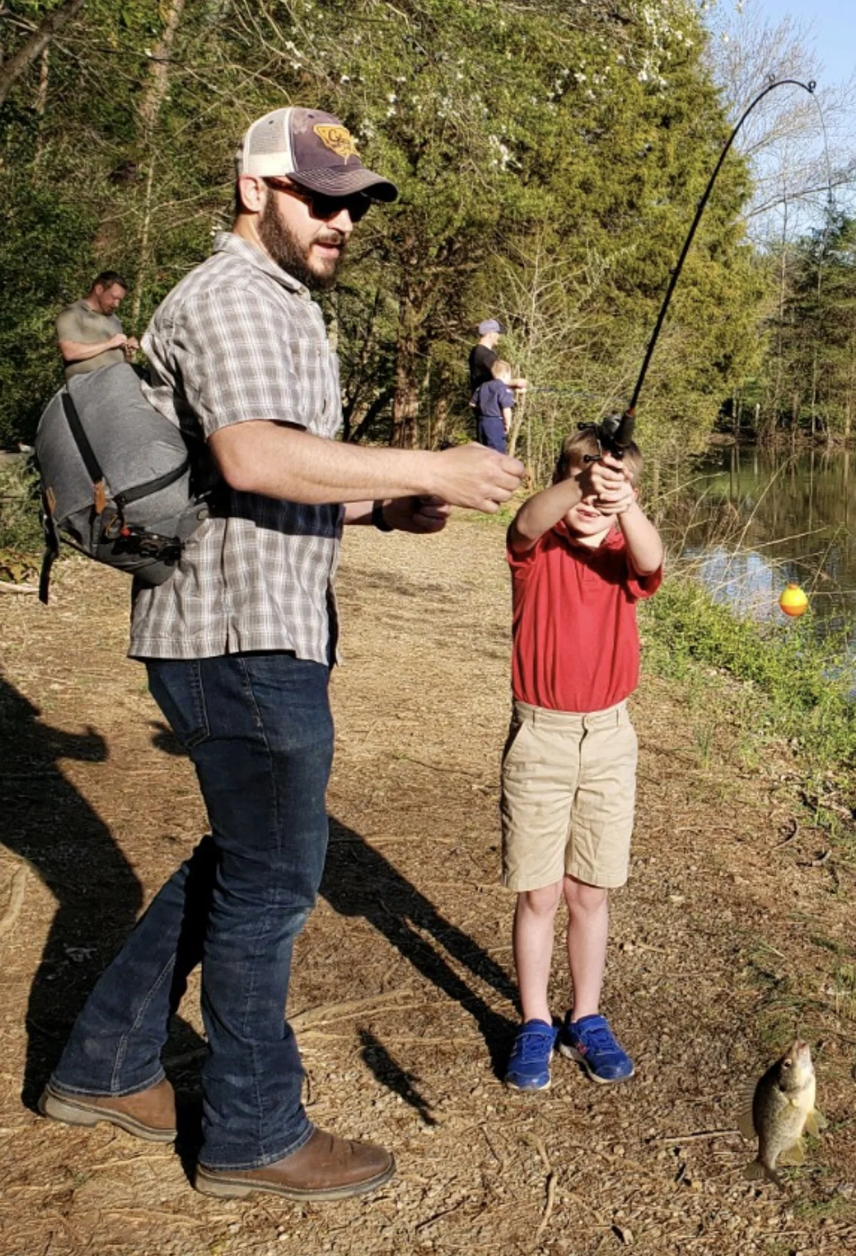 Me and Owen with one of his five fish (pic courtesy of Scott Vines)