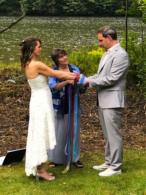 The couple’s handfasting ritual united them to each other, their ancestral cultures, and to their marriage vision and values (guest photo).