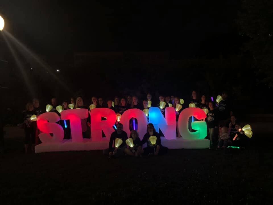 Walkers at the 2019 Leukemia &amp; Lymphoma Society’s Light the Night Akron at Lock 3 in Akron, Ohio post walk.