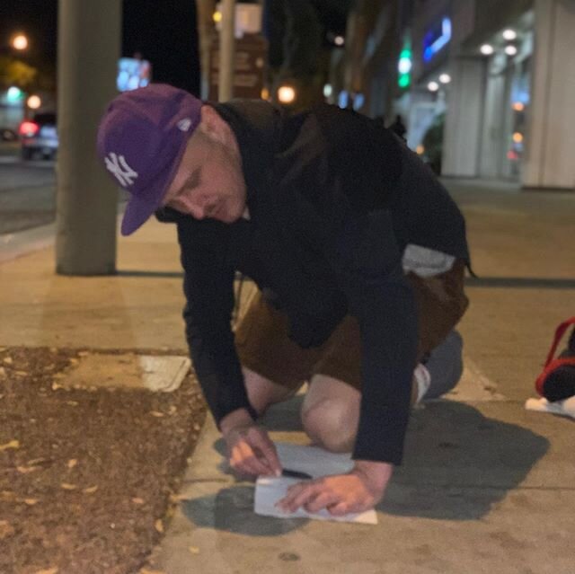 Tedd Kerr rubbing a Rock Hudson marker in West Hollywood. #thegayrub