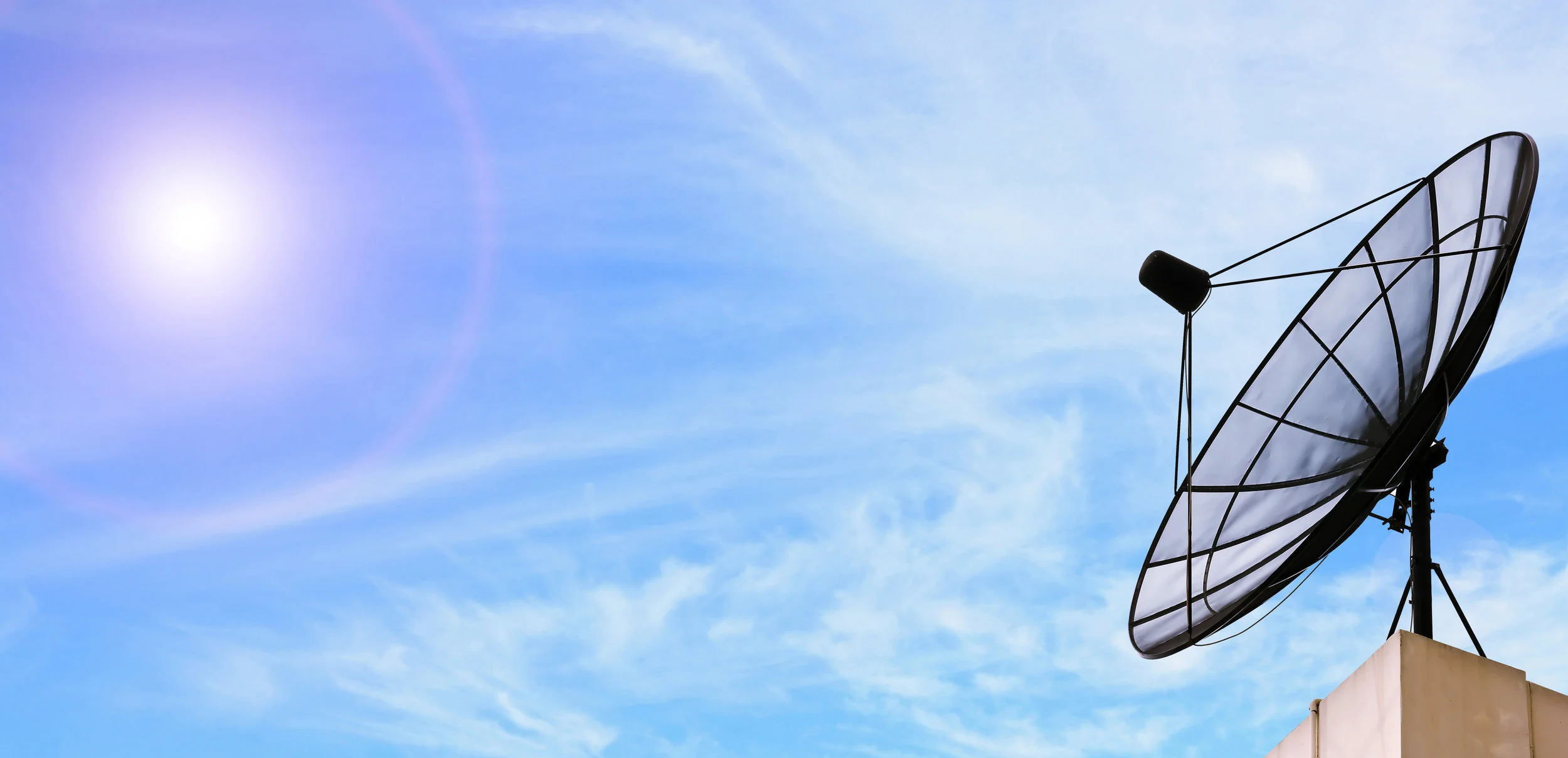 020488870-satellite-dish-over-sunny-sky.jpeg