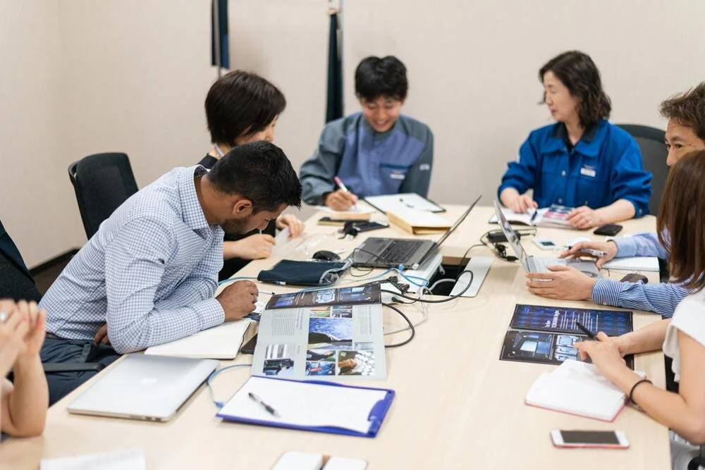 Design & Development meeting. Gihan and the Toray team review new innovations and test results.