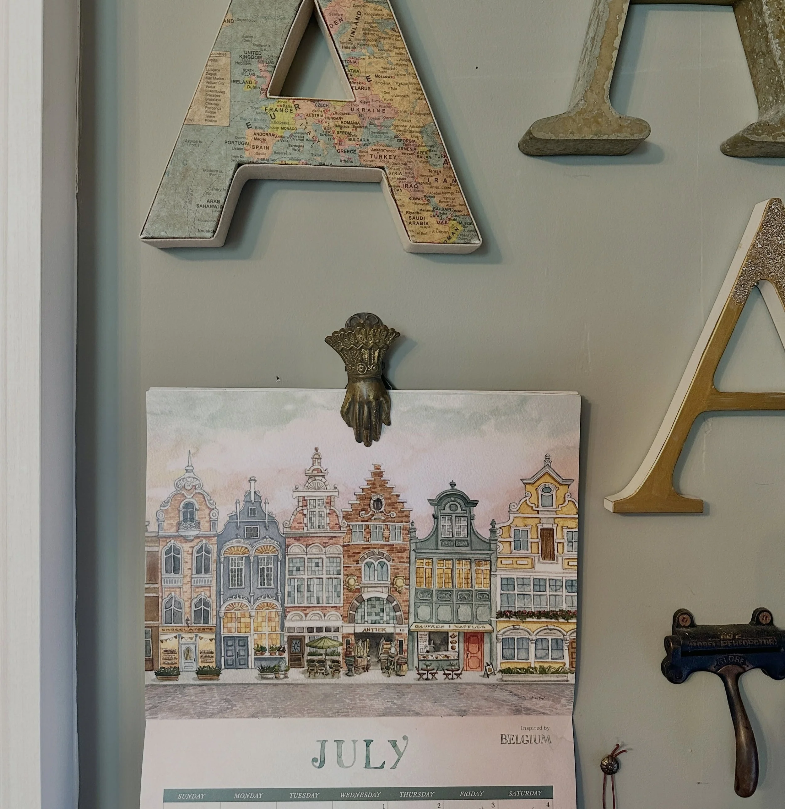 My current calendar: &ldquo;Dreaming of Europe&rdquo; has me thinking back to visiting Belgium two years ago. The architecture was so magical, and this painting was inspired by our trip. We stumbled upon an antique shop that had a restaurant inside, 