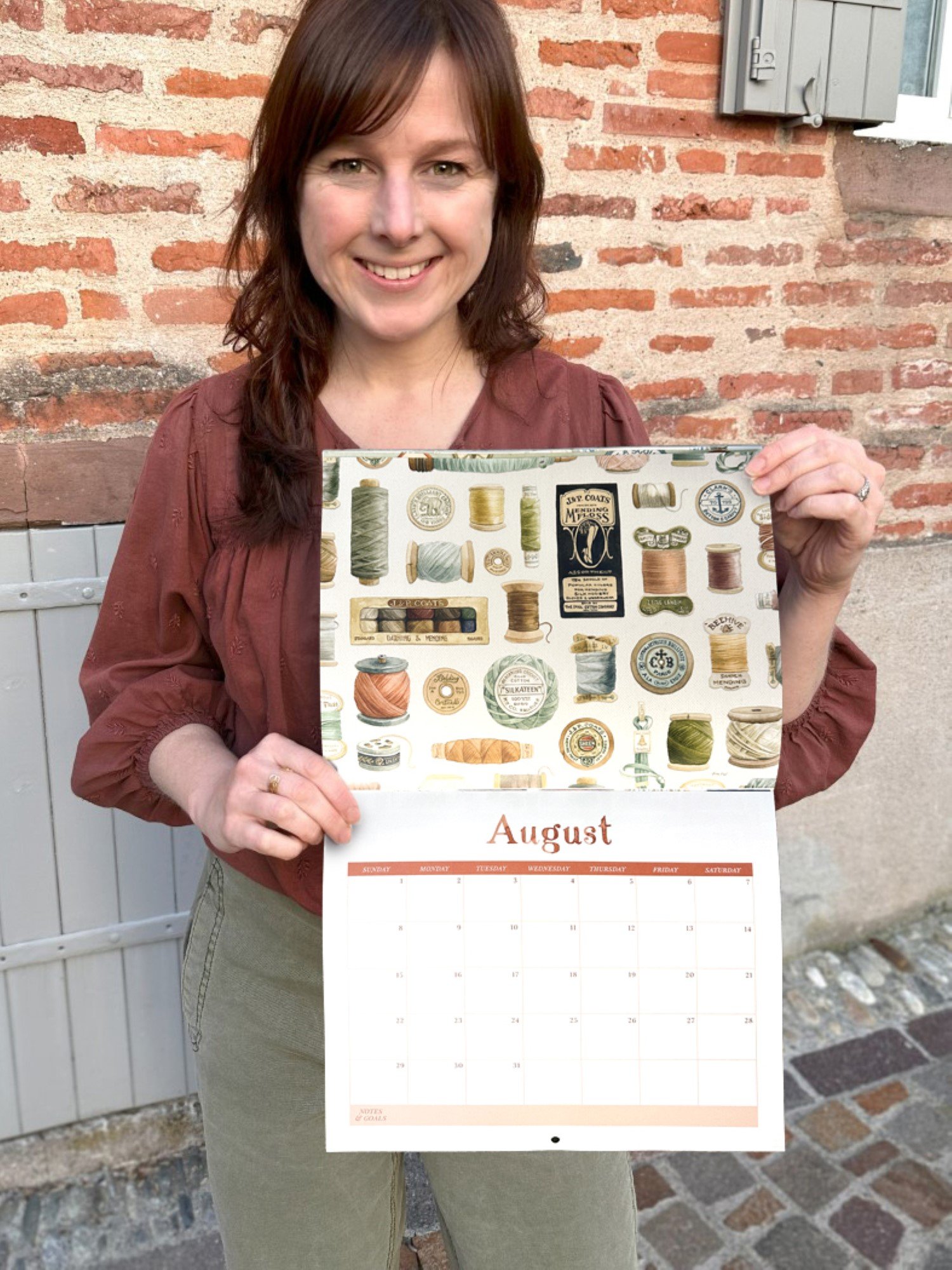 Alicia holding collection calendar (Custom).jpg
