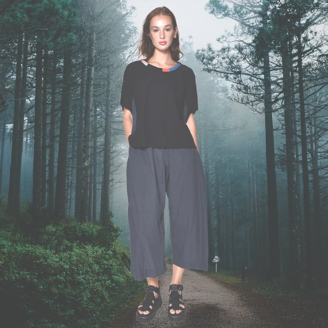 A comfortable but stylish cotton top with neck detail paired with a charcoal pair of gaucho pants.