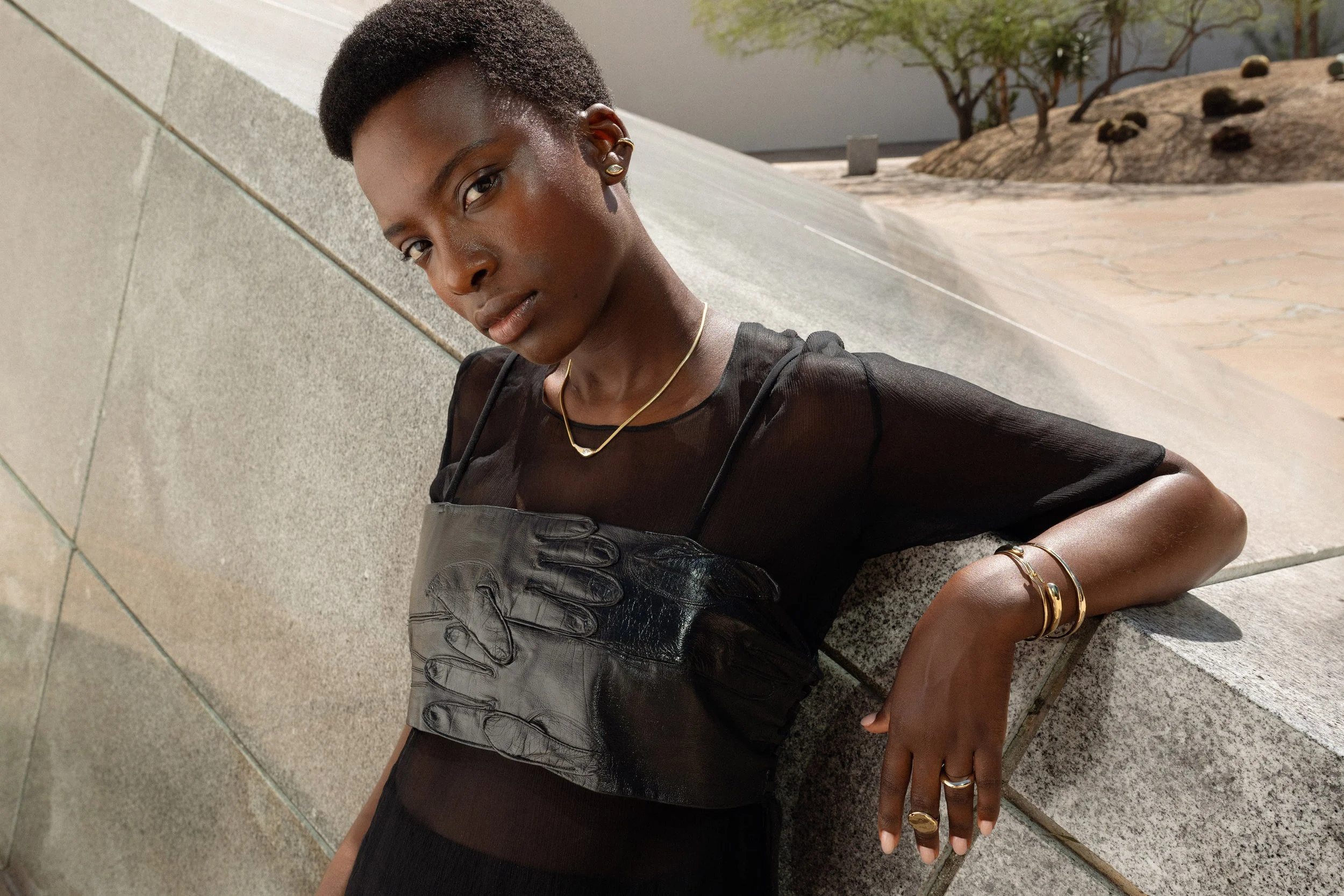 The Sibyl Ear Cuff and marquis diamond Horus Studs with the Where the Light Comes Through Necklace. On hand: the Ra Signet Ring, Persephone Ring, Portal and Orbit Bracelets,  Inverse Cuff. 