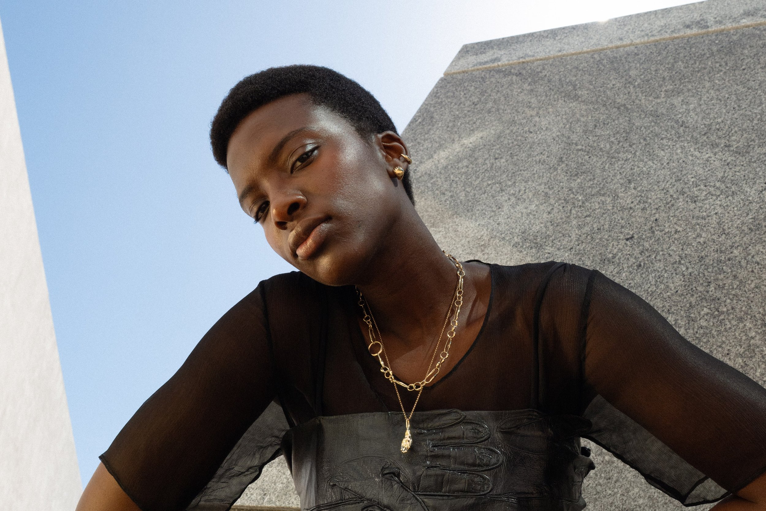 From top: Sybil Ear Cuff, Held Earrings, Metanoia Handmade Chain and the Held Necklace. Made in Denver, CO from recycled 14k gold.