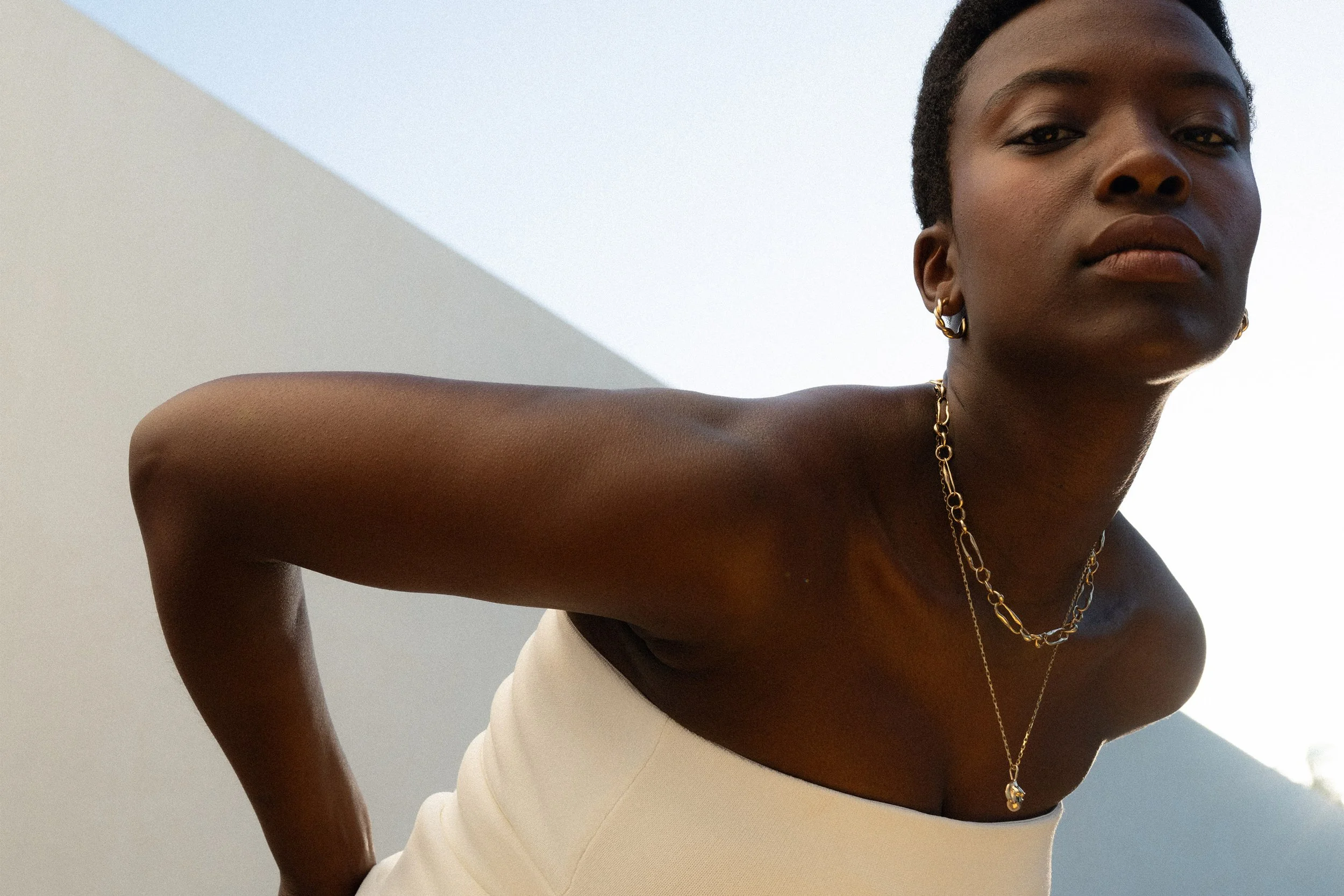 From top: Helix Hoops. Metanoia Handmade Chain and the Soft Body Venus Necklace. 