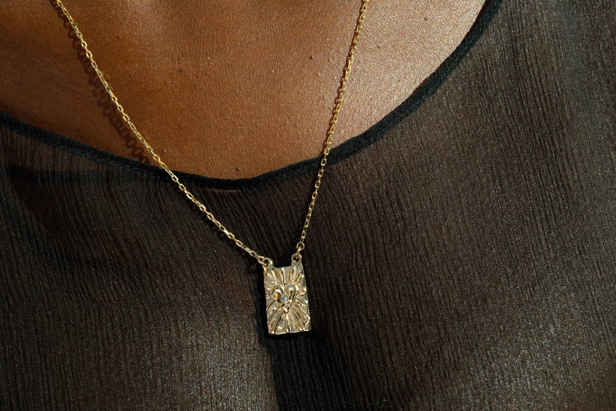 New for the season, the Angelic Light Scapular Necklace. Inspired by traditional Catholic scapular-style necklaces. Handmade using traditional lost-wax casting techniques in solid, 14k recycled gold