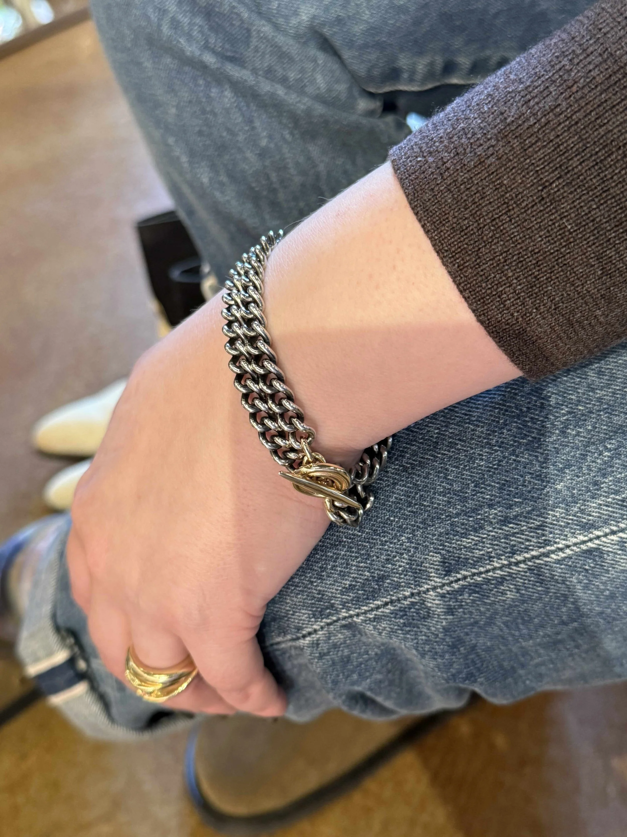 Meredith wears the Vortex Chain Necklace as a bracelet