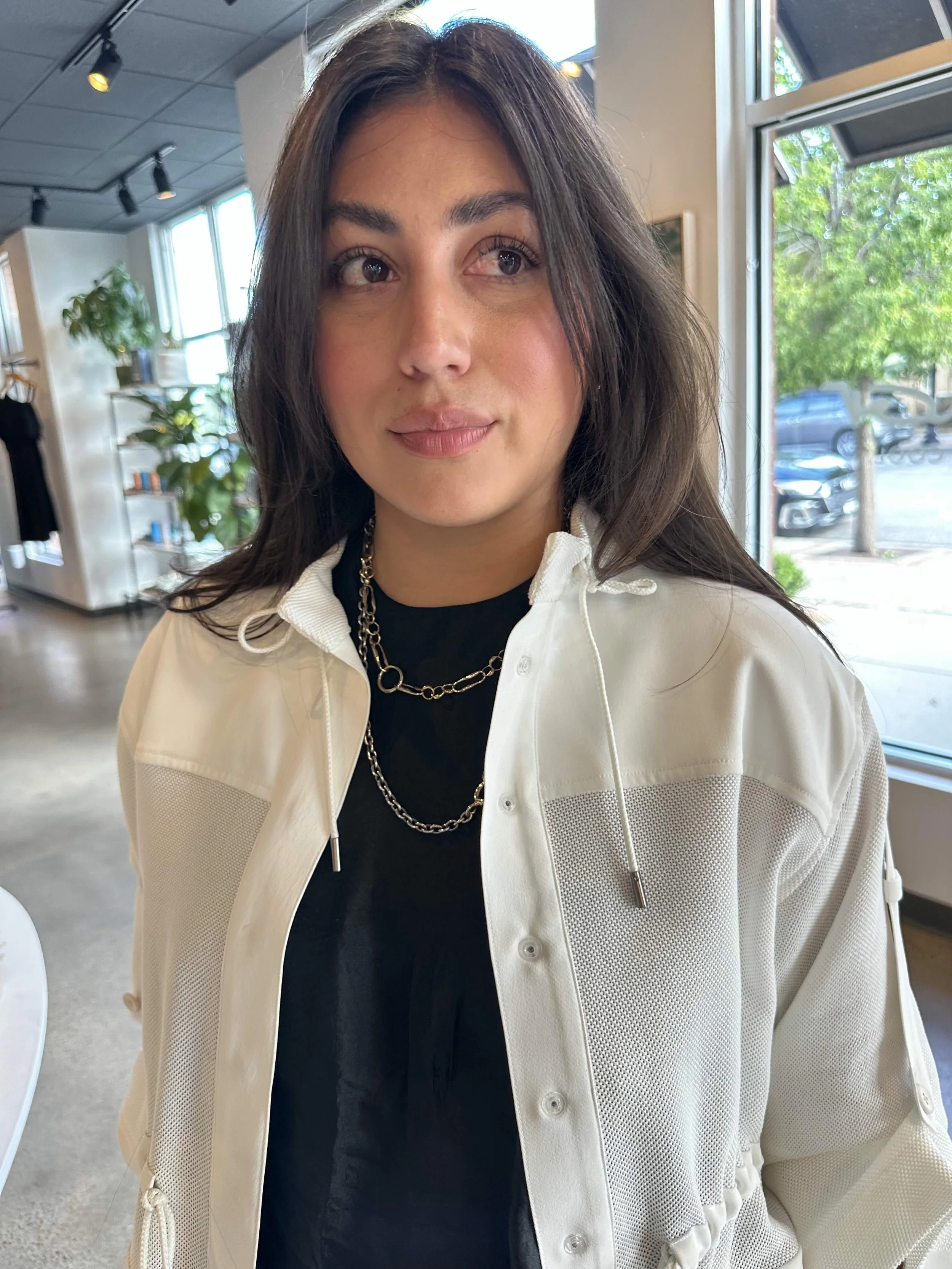 Alex of Eleanor boutique in a killer necklace stack