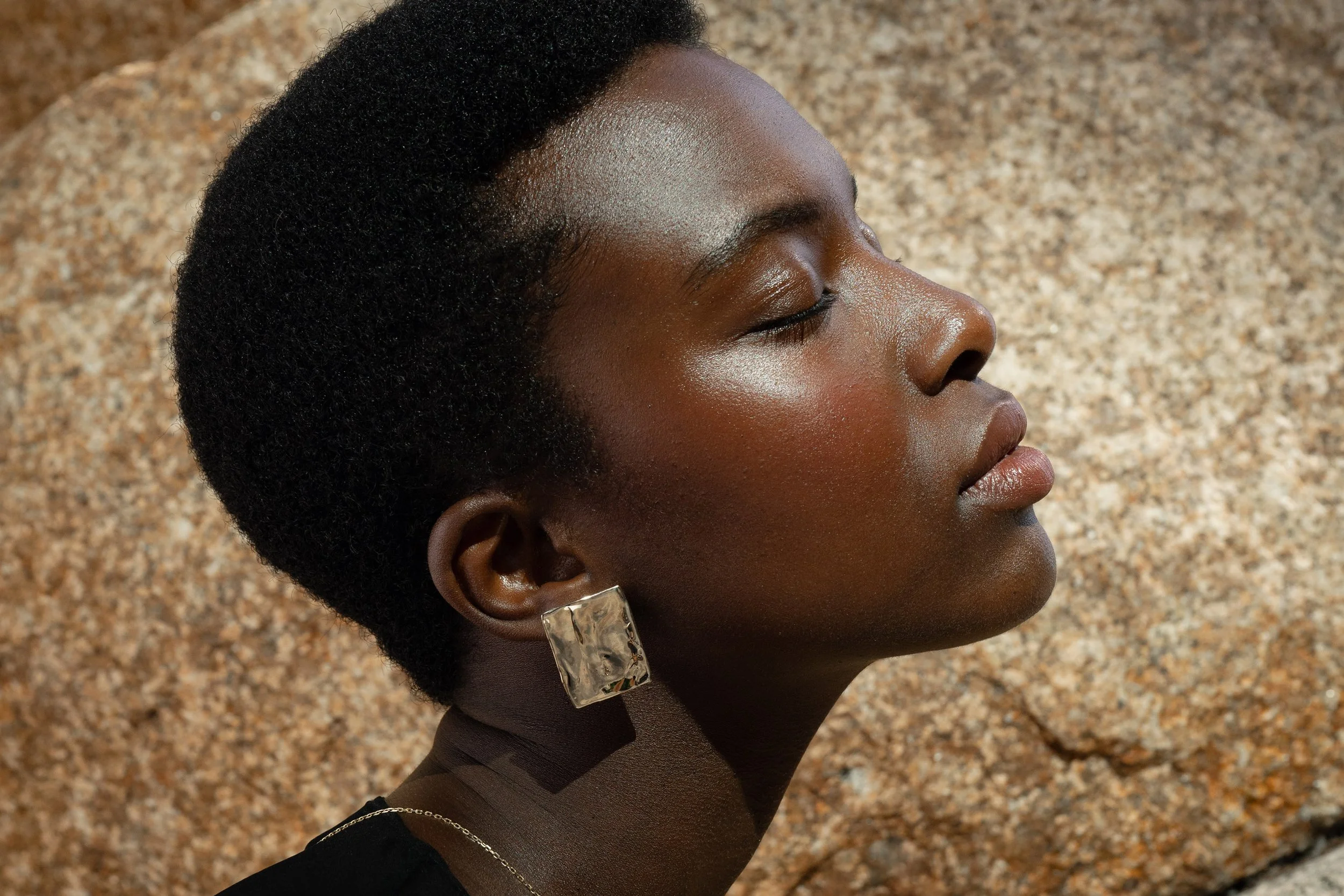 Anna wears the Plane Earrings. Handmade in solid recycled 14k gold.
