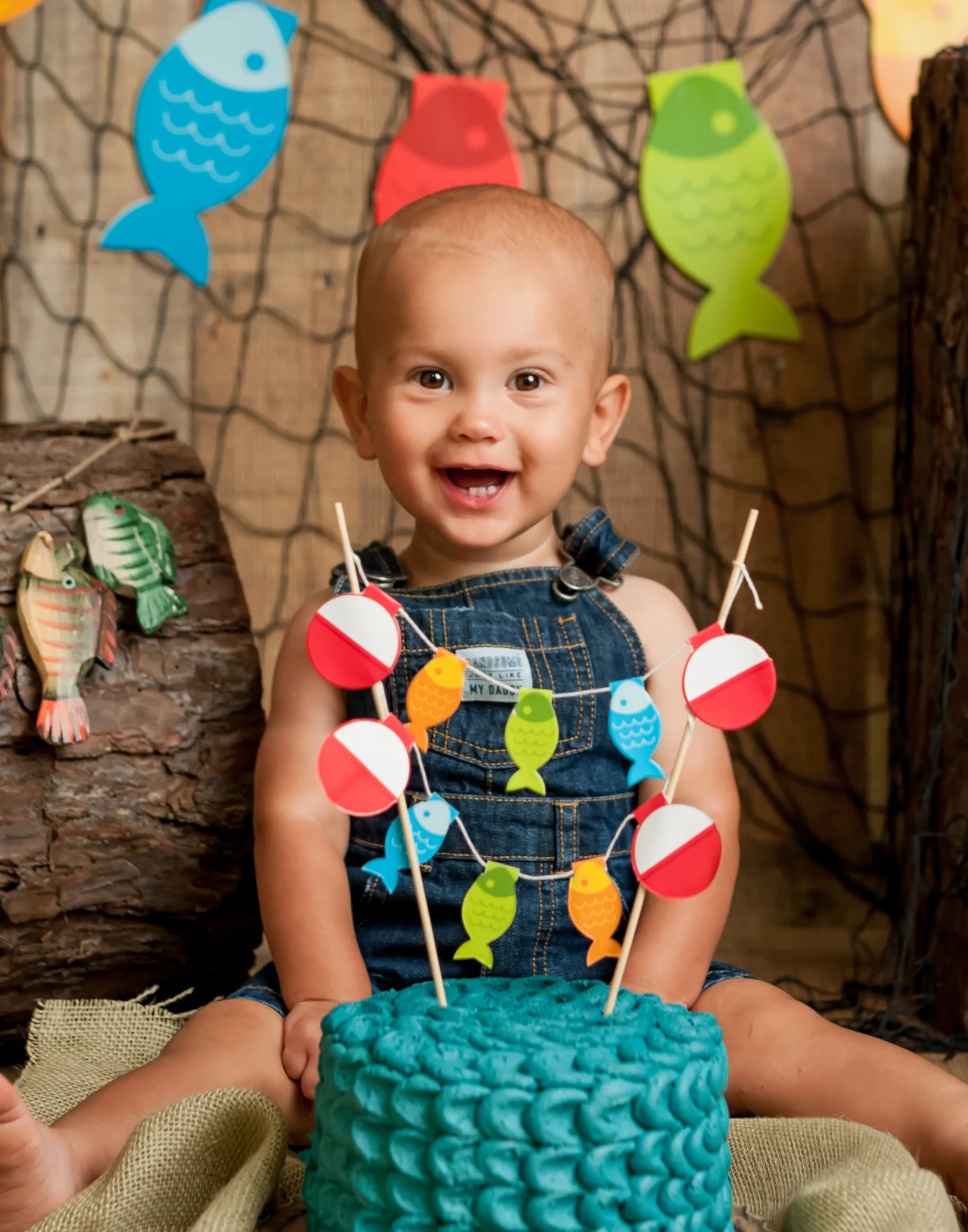 little boy with a gone fishin’ theme with junebug photography studio in manhattan, ks