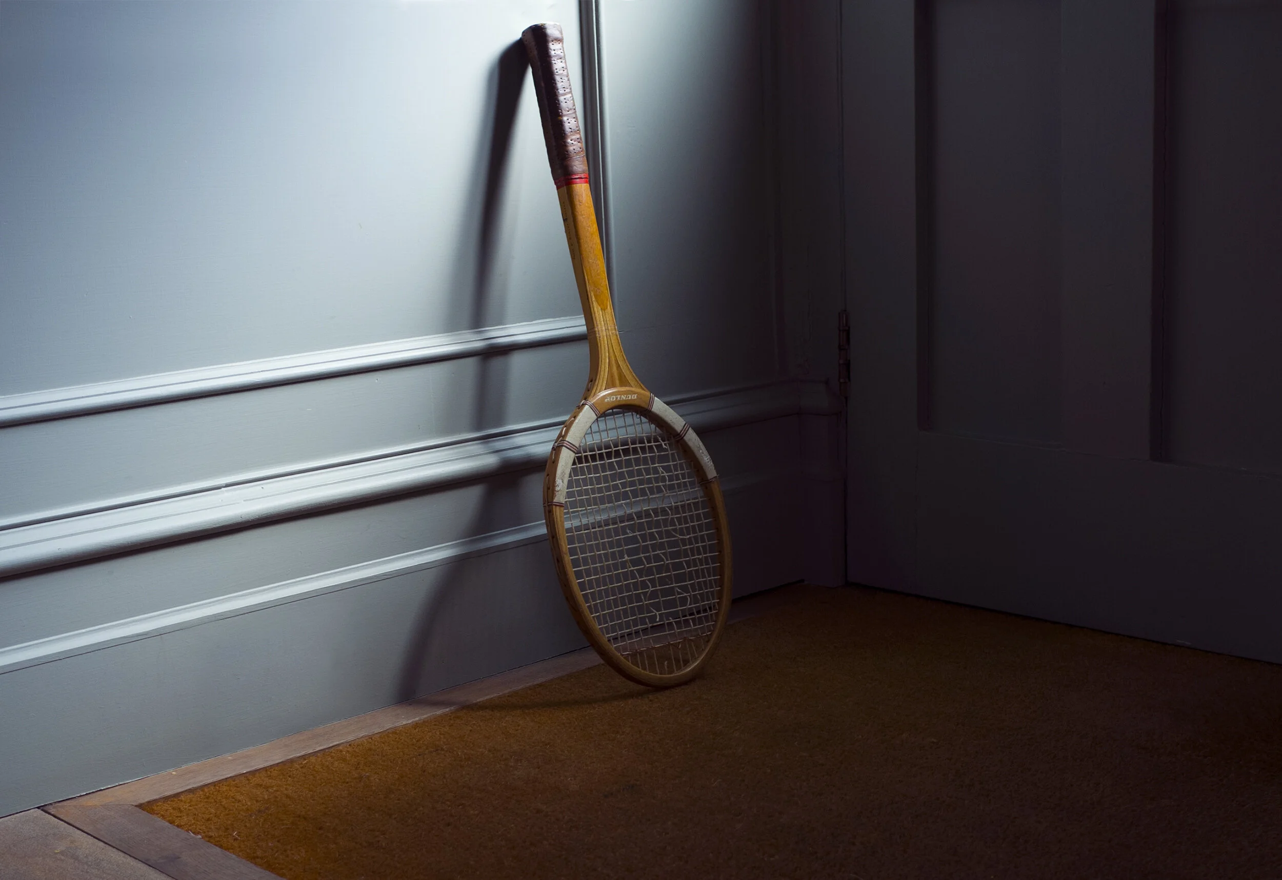 tennis racket leaning.jpg