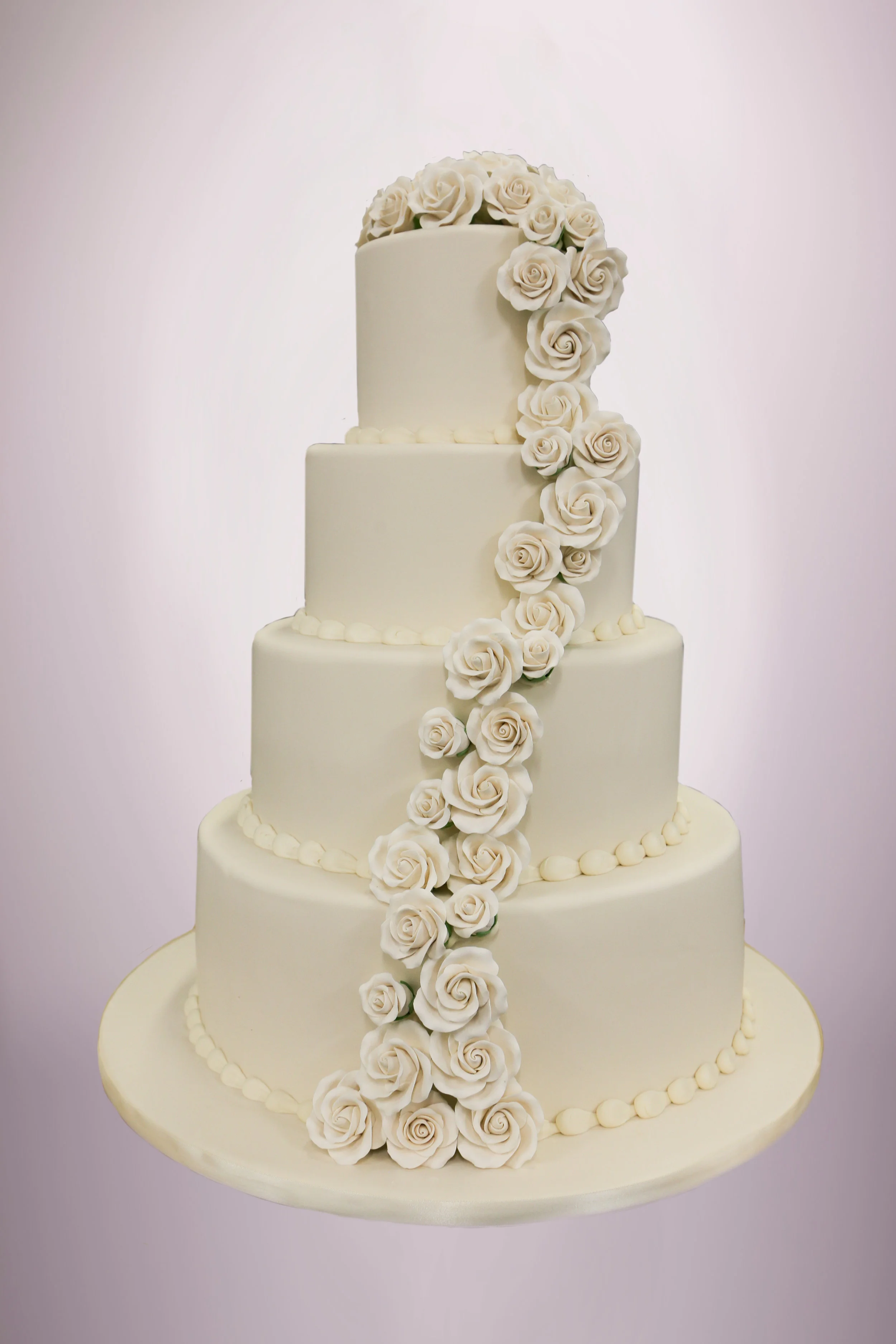 Custom_White Roses_4Tier_Wedding.jpg