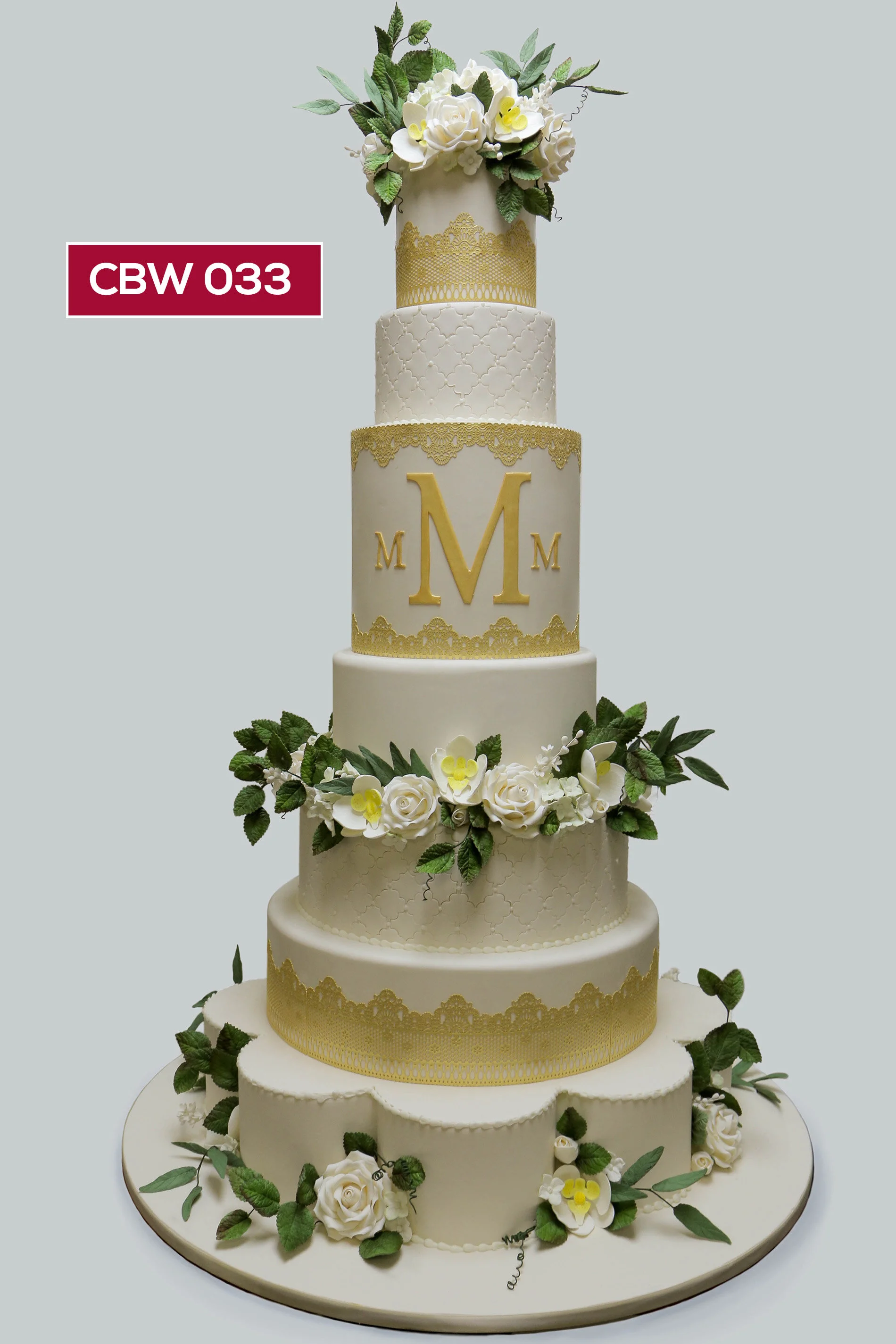 CBW033_Custom_Wedding_Maria_monogram_double barrel_cake lace_gold_custom_rose_phaelonopsis orchids_leaves_petal tier.jpg