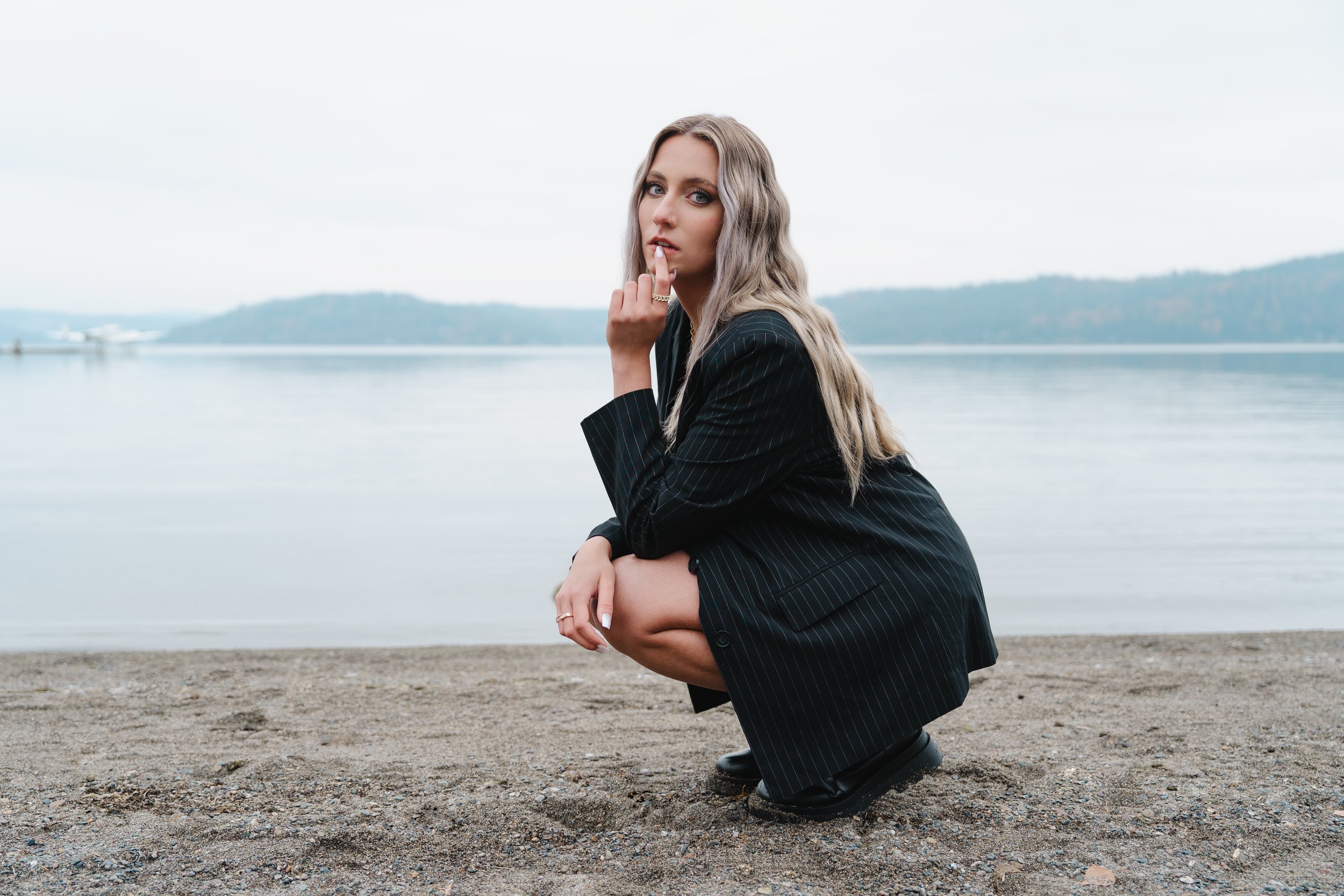 fashion and editorial model in a blazer posing for an editorial photo