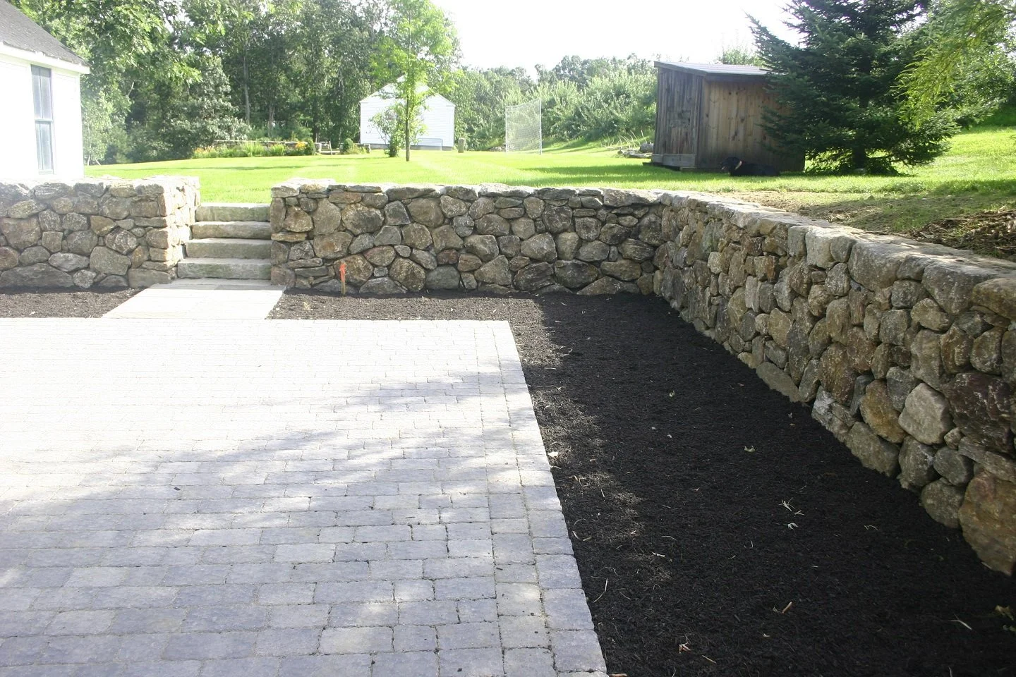 Add Texture and Visual Interest to Your Landscape With a Retaining Wall in the Wellesley, MA Area