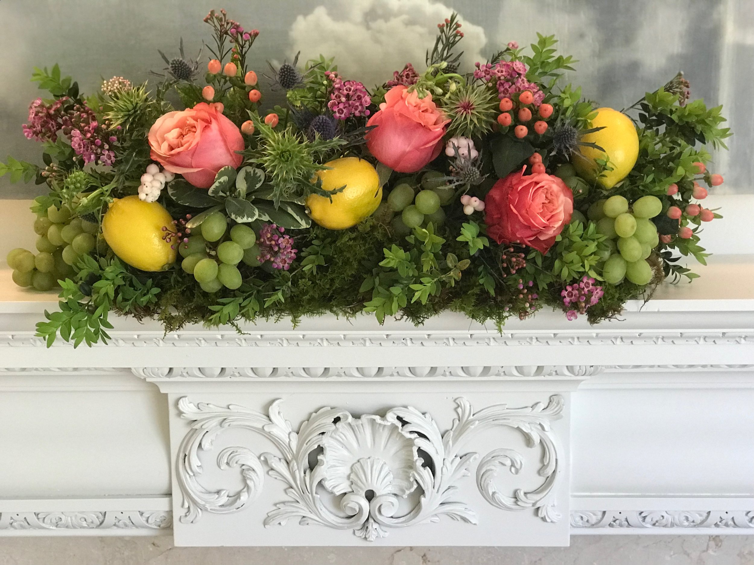  A “happy” mantle with lemons, grapes, and Art Roses at a private home on Lookout Mountain. 