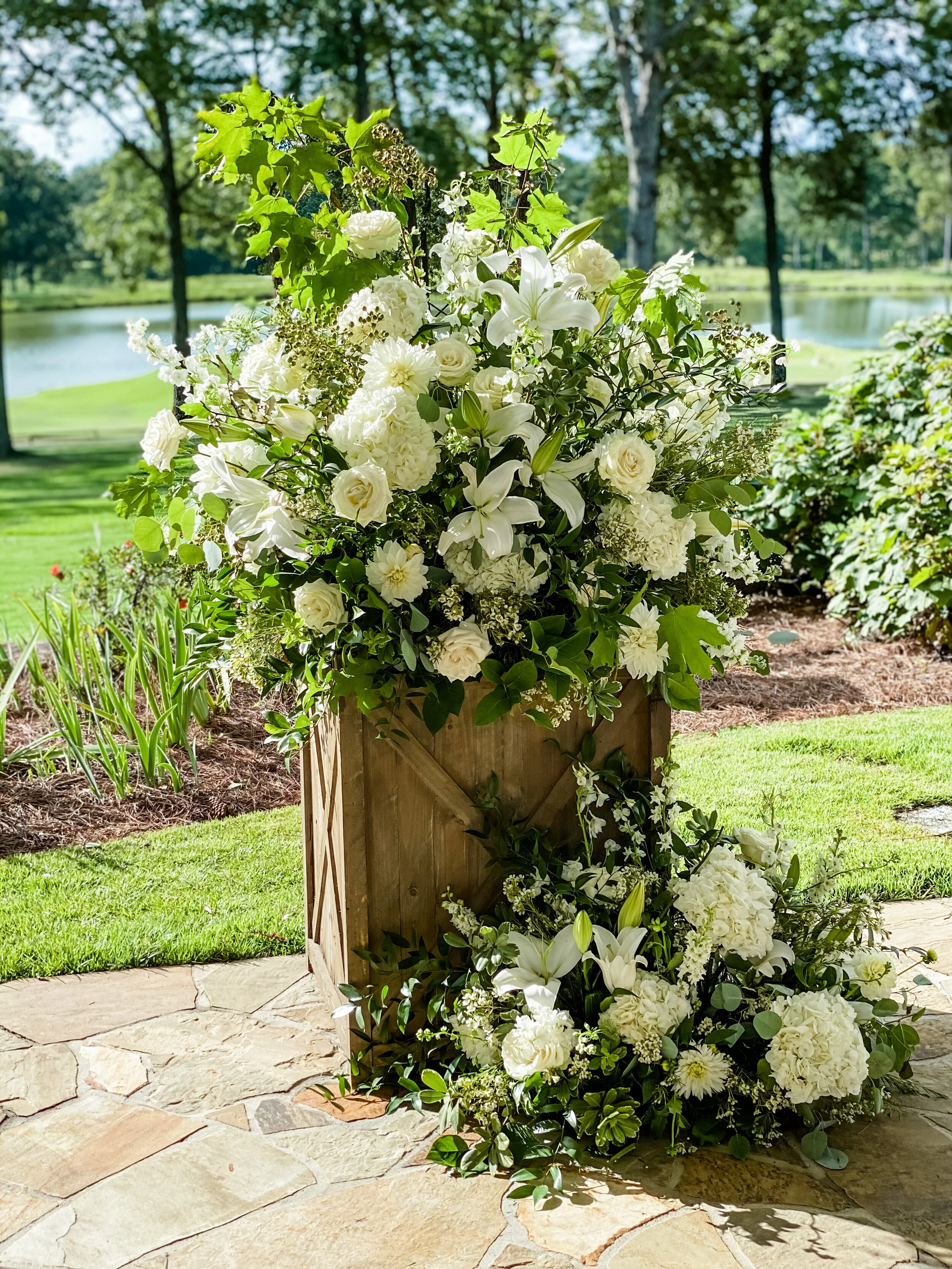  Two of these extra large planters flanked the bride and groom for their tented ceremony. 