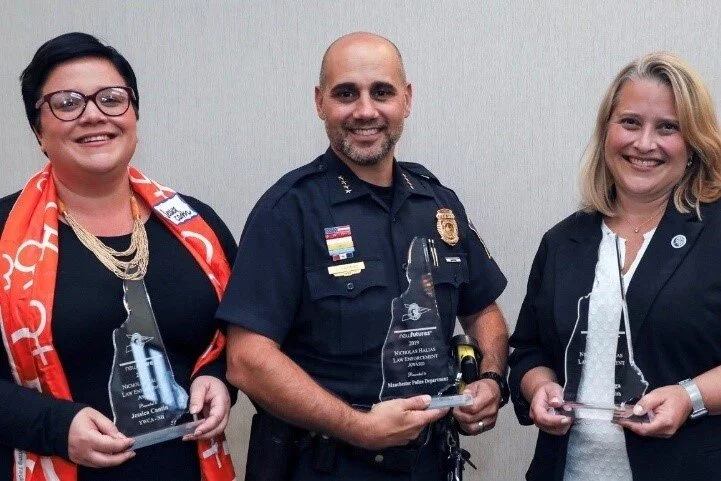 [From left] Jessica Cantin of YWCA NH, Chief Carlo Capano of Manchester PD and Lara Quiroga of Amoskeag Health.