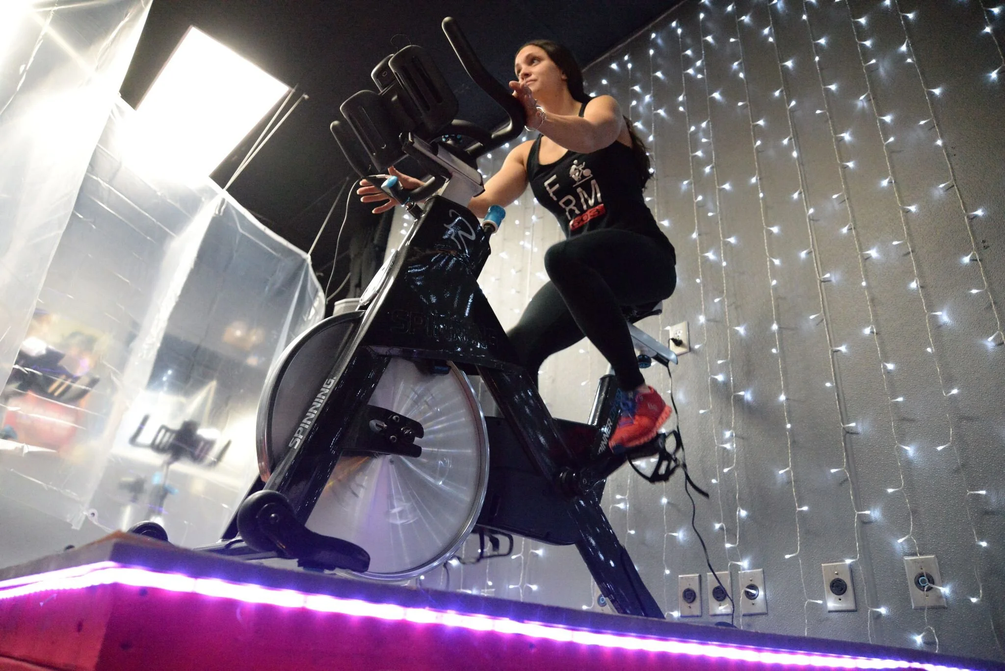 Owner of Form 603 Personal Fitness & Cycling Studio in Keene, Ryann Singleton, has set up individual bubble barriers around the spin bikes in her studio using shower curtains to provide an extra level of comfort and safety for participants.