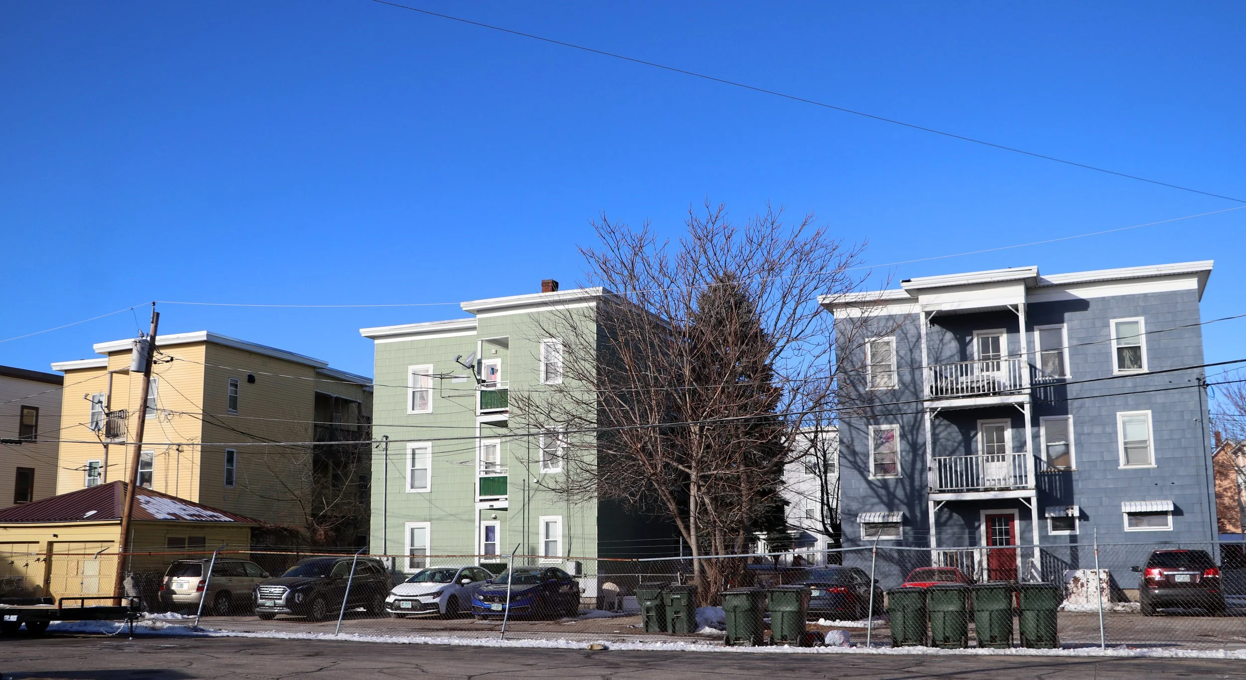  Photo by Allegra Boverman. The backs of cheerfully painted buildings on Bell Street South Back, which is off of Union Street. 