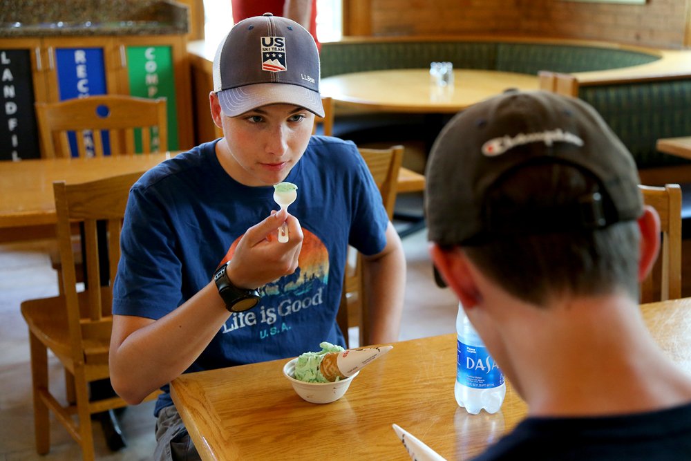  Dakota Mako enjoys his ice cream with his brother, Jeremy, on Tuesday, June 14, 2022 in Durham at the UNH Dairy Bar. Olivia Falcigno/Seacoastonline 