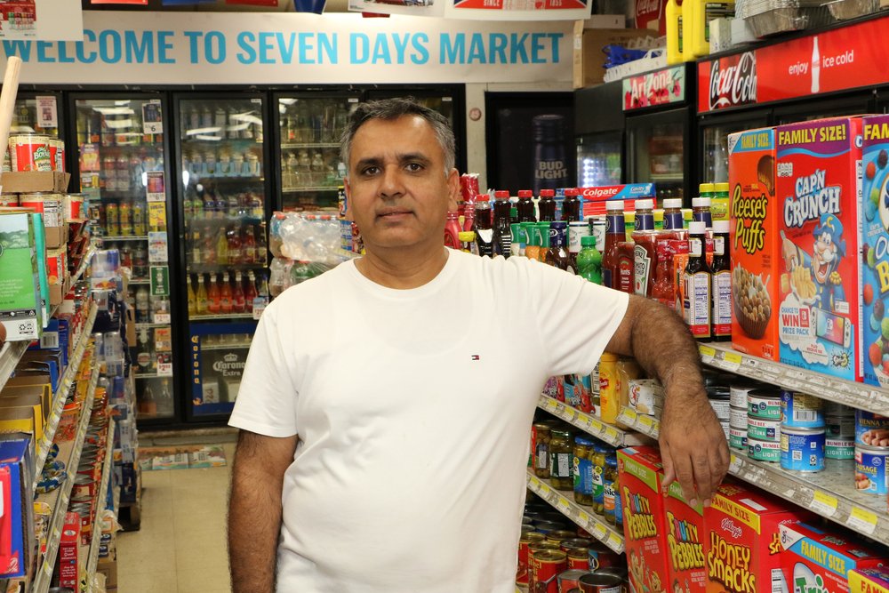  Amjad Rana, at his store, Seven Days Market, in Manchester. He has owned this store for 18 years. He has owned other businesses in Milford, Derry, and elsewhere in Manchester but now just owns this store. (by Allegra Boverman) 