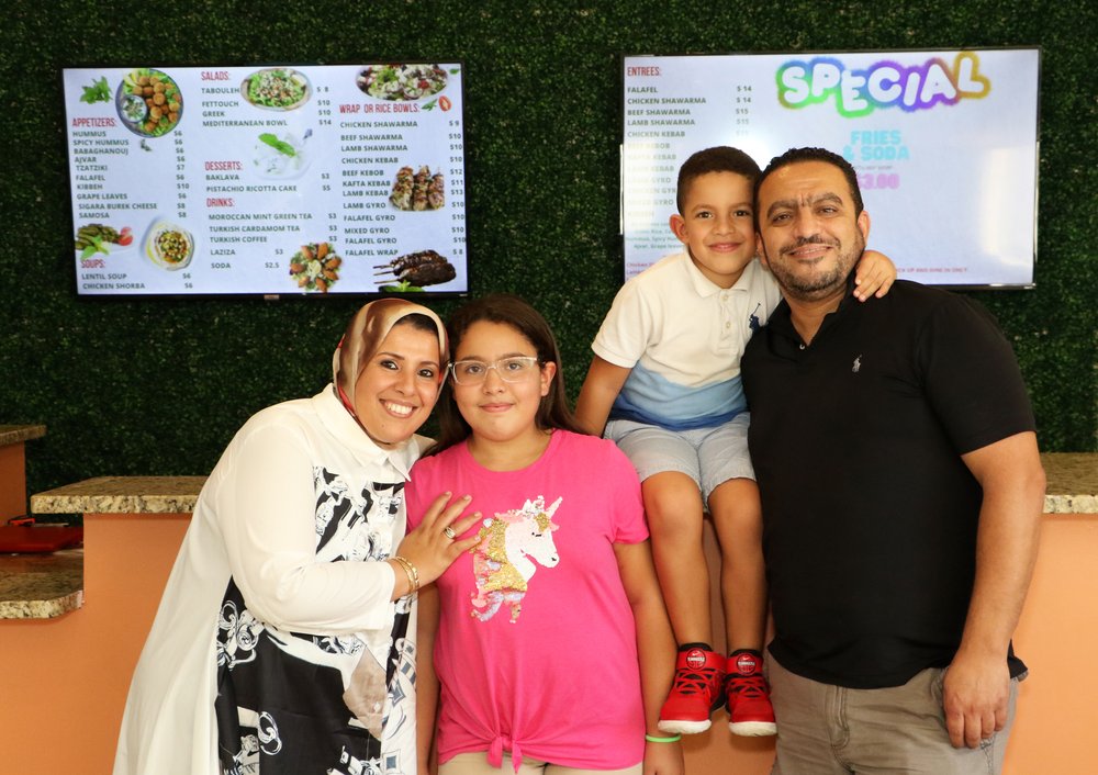  Omar Abouzaid with his wife Ibtisam Azri and two of their three children, Houria Abouzaid, 10, and Reda Abouzaid, 5. (Missing from the photo is their oldest son Yasser Abouzaid, 12.) They own Al Basha Mediterranean Grill in Manchester for two years,