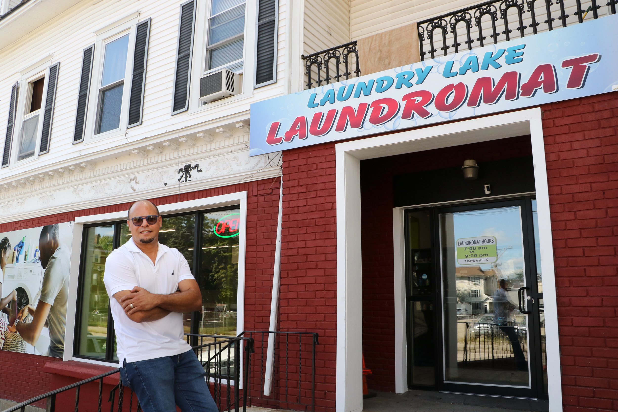  Rafael Lora bought this existing laundromat, then renamed it Laundry Lake Laundromat, which also has apartments upstairs, in Manchester and renovated it, reopening it in February 2022. He also owns Caribbean Market and is renovating and expanding it