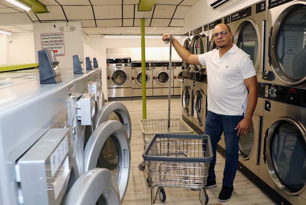  Rafael Lora bought this existing laundromat, then renamed it Laundry Lake Laundromat, which also has apartments upstairs, in Manchester and renovated it, reopening it in February 2022. He also owns Caribbean Market and is renovating and expanding it