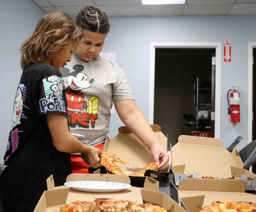  At the My Turn drop-in center on Saturday evening. The new location is on Granite Street on the West Side of Manchester. Kids and teens were enjoying video games, augmented reality, pizza, relaxation, some magic tricks and more. Andres Rivera, 10 1/