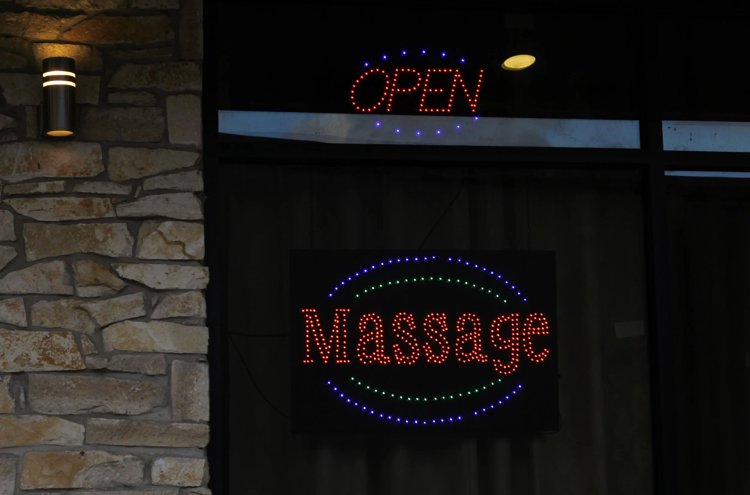 Does NH need to license massage establishments?