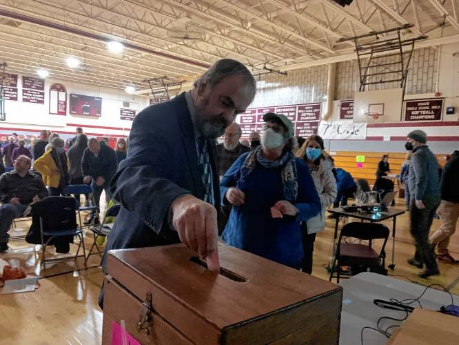  Wilton Selectman Kermit Williams cast his ballot on the issue of whether Wilton should remain under a Town Meeting form of government or adopt ballot voting for all issues in March 2022. Monadnock Ledger Transcript STAFF PHOTO BY ASHLEY SAARI​​​​​​​