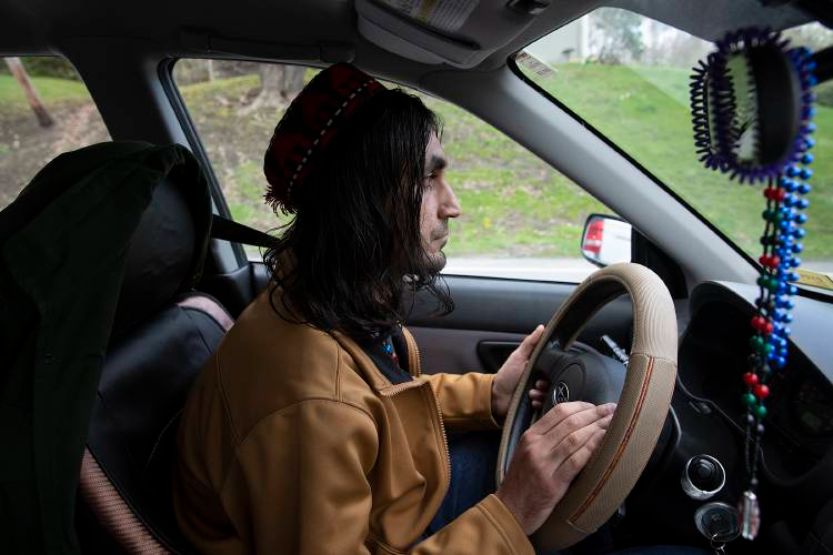  Abdullah Shah drives home to the Hotel Coolidge after getting his tires changed in White River Junction, Vt., on Tuesday, April 25, 2023. When Shah first arrived in the Upper Valley he was reliant on public transportation and volunteers offering rid