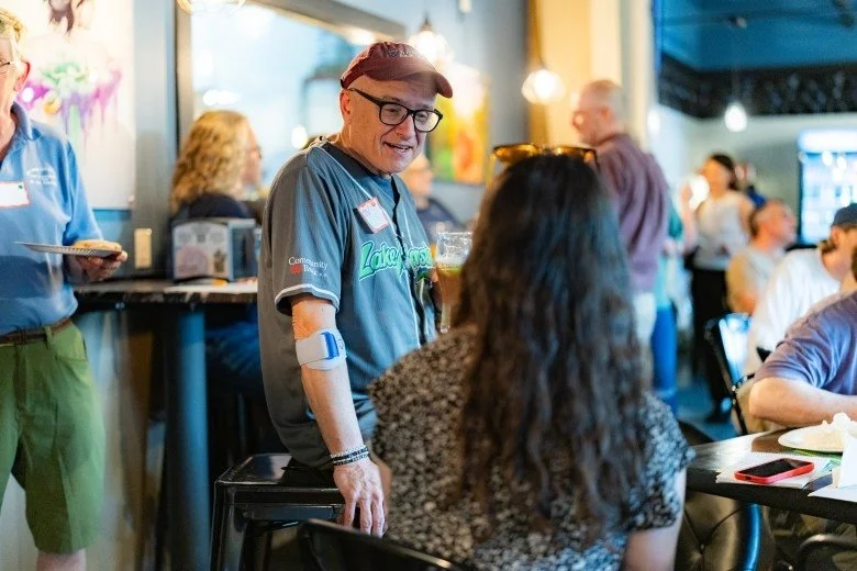  Rachel Wachman, the Community Editor at the Concord Monitor, speaks with a member of the public during the Publisher’s Crawl at Lithermans Limited Brewing Company on June 9, 2026 in Concord. Credit: ALEX MILLER / For the Monitor 