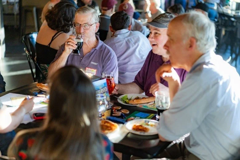  Members of the public speak with Monitor reporter David Brooks during the Publisher’s Crawl at Lithermans Limited Brewing Company on June 9, 2026 in Concord. Credit: ALEX MILLER / For the Monitor 