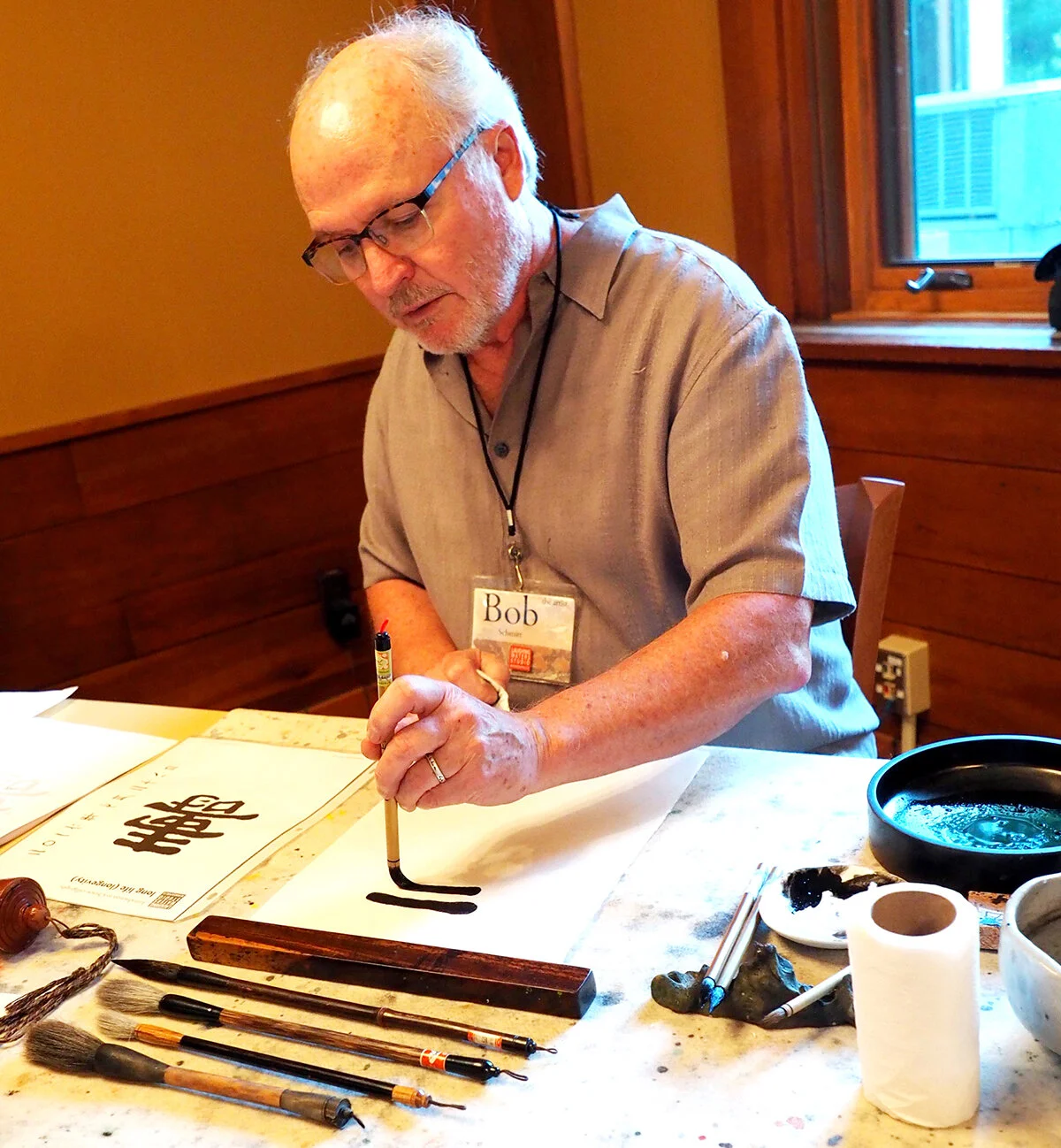 Bob working on painting.jpg