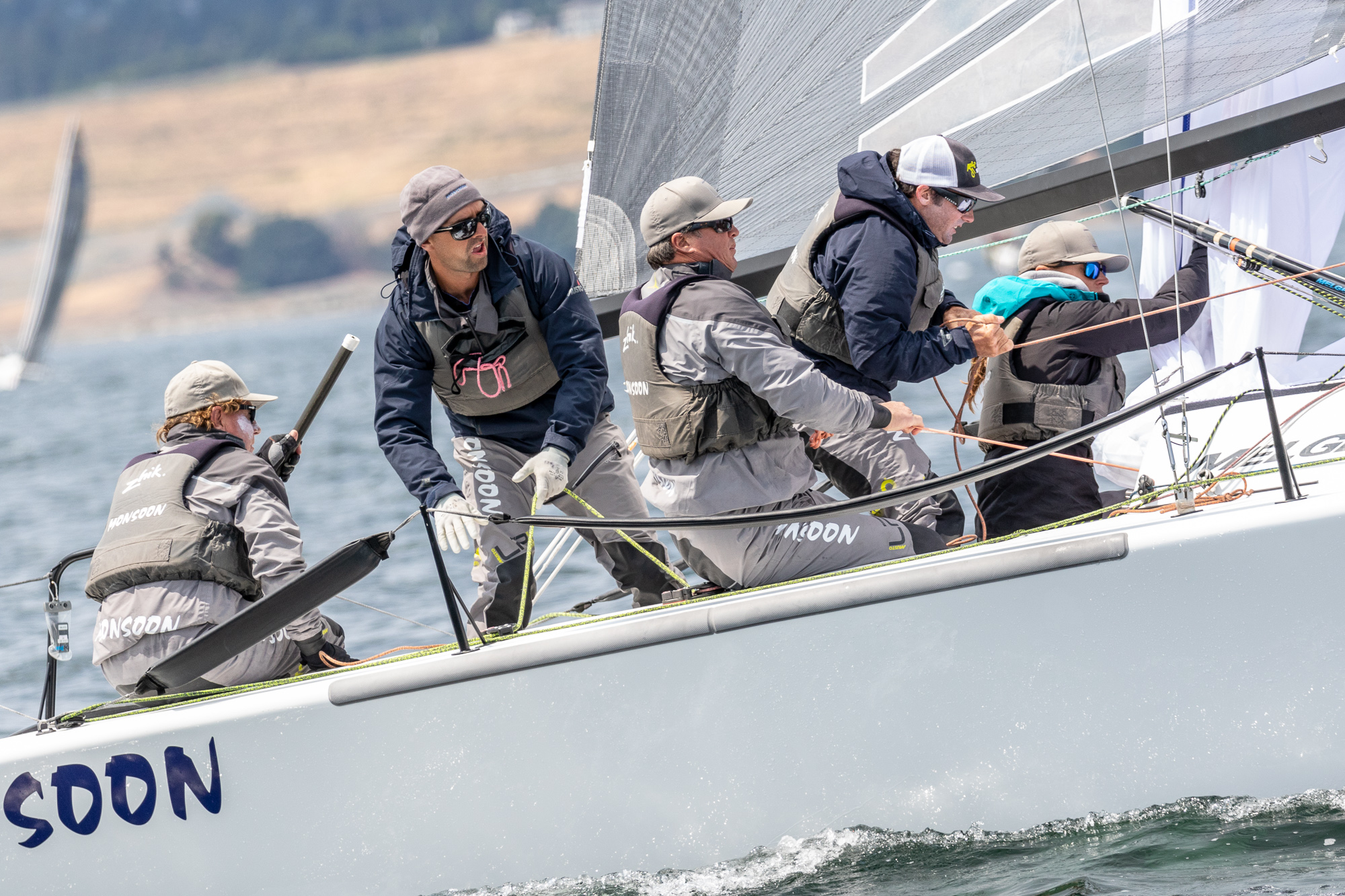 2018 Melges 24 Canadian National Champion - USA851 MONSOON, Newport Beach, California;Bruce Ayres - helm, owner, Jeff Reynolds - spinnaker, Mike Buckley - jib & tactics,Chelsea Simms-mast, George 'Bear' Peet - bow - Photo: IM24CA/ZGN STAGE 1 - 2018 CANADIAN NATIONALS, VICTORIA, BC (June 2, 3) Following a month of exhilarating training in solid planing conditions Victoria was beset with uncharacteristic light air. To no one's surprise, Melges 24 class stalwart and light-air wizard from Newport Beach, California Bruce Ayres' A851 MONSOON carried the weekend. Hot on MONSOON's tail was Alan Field's USA829 WTF out of Southern California and Richard Reid's CAN853 ZINGARA of Port Credit, Ontario.