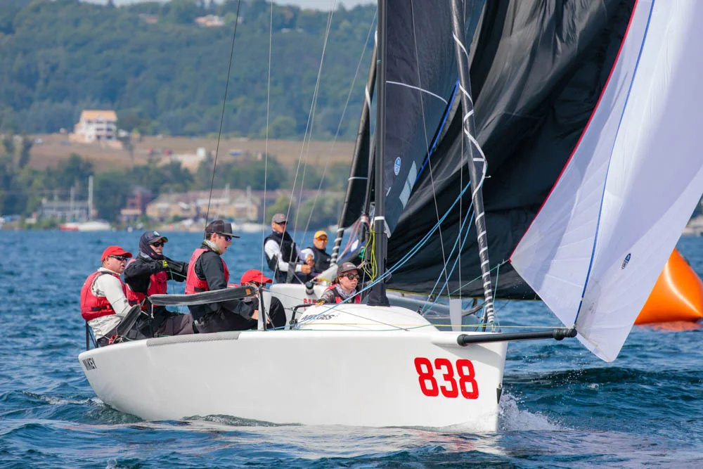 Kevin Welch' s MiKEY with Jeff Madrigali at the helm celebrated a moderate day winning Race 2. - © Bill Crawford - Harbor Pictures Company