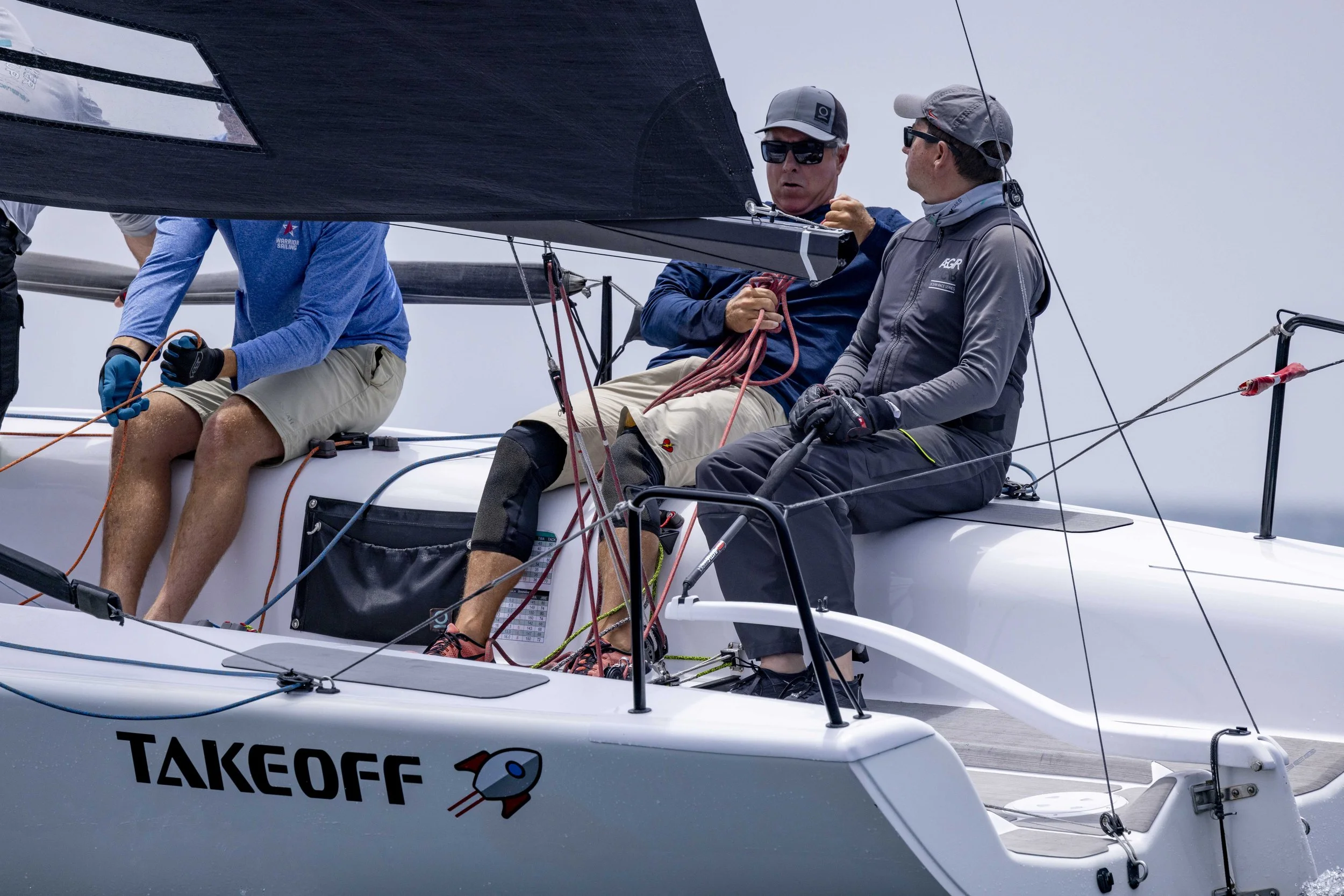 Andrew Picel at the helm of Melges 24 Take-Off