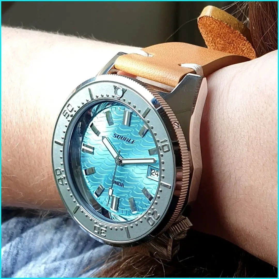 Miss Geneva Blue reluctantly modelling the very pretty 500m Squale 1521 &quot;Onda&quot; Aquamarine : 
Now back in stock !
.
.
.
.
#squale #divewatch #surf #surfwatch #surfchick #diverbelow #swissmade #onda #wave #wotd #unisex #watchesofinstagram #te