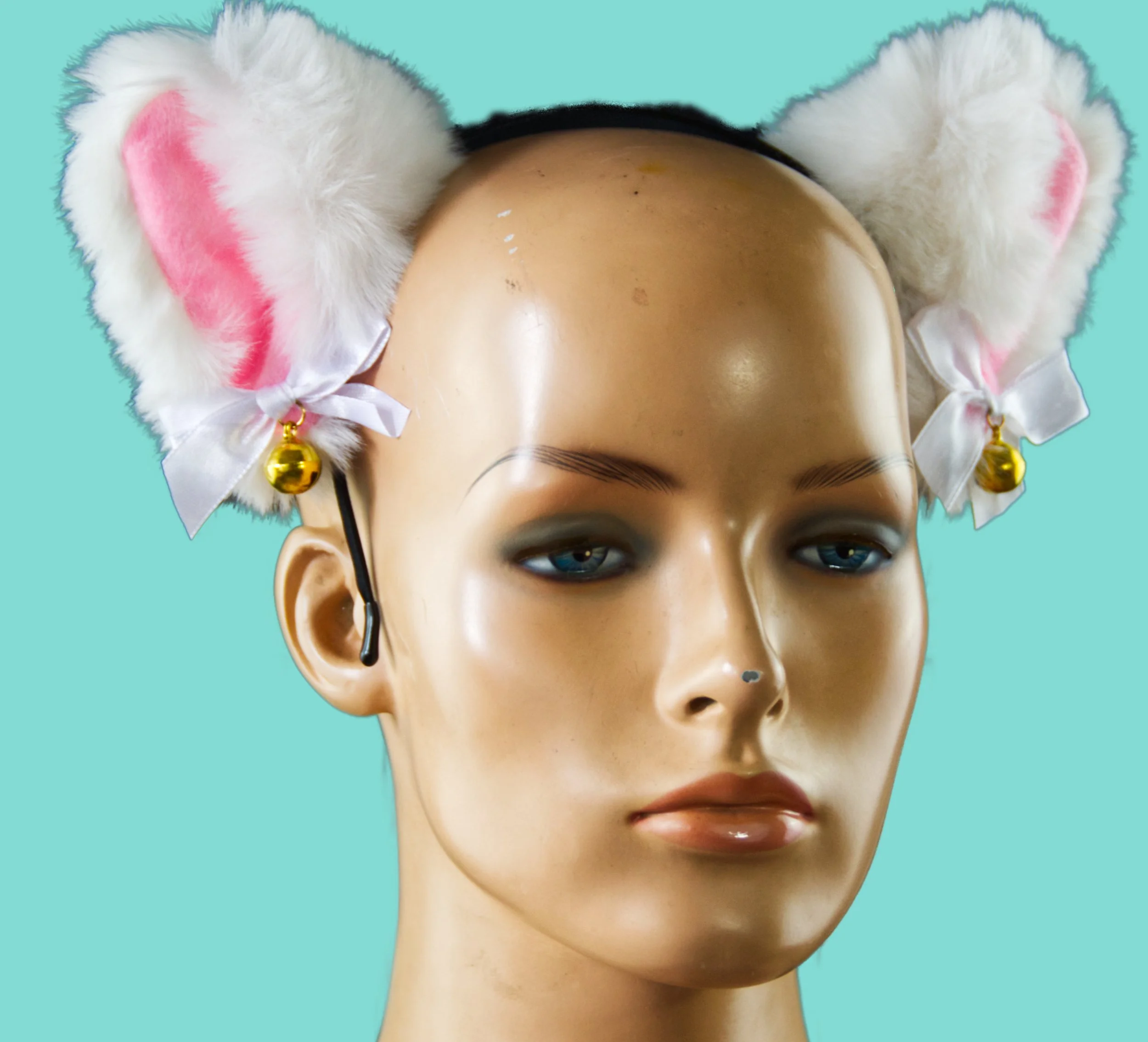 white and pink ears with bells.jpg
