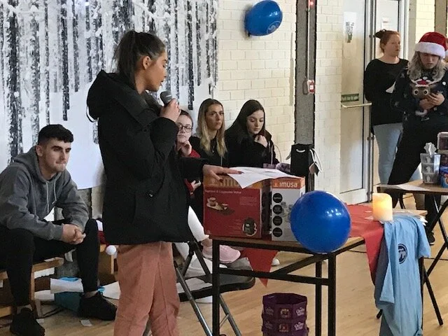 Sophie Dempsey performing at the Christmas Party and Quiz