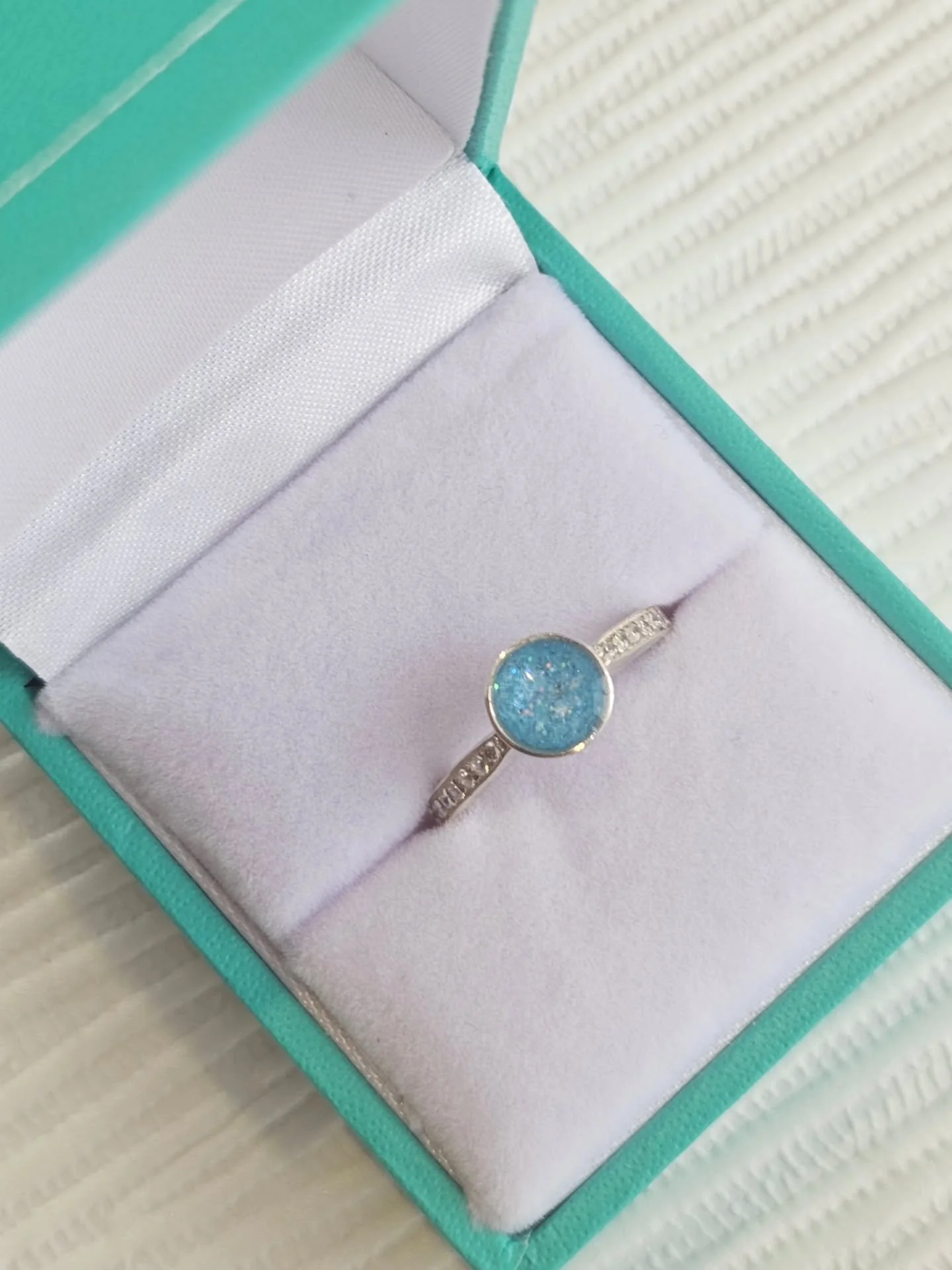 A beautiful memorial set, holding a special &amp; very missed father's ashes. Hidden ashes, hand set in Aquamarine inspired resin to mark his March birth stone 🩵✨️