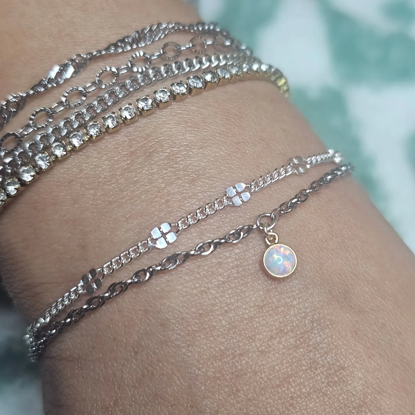 Loved adding to this impressive permant stack 💕 a new Sterling Silver clover bracelet &amp; and adding a golden opal charm 💕