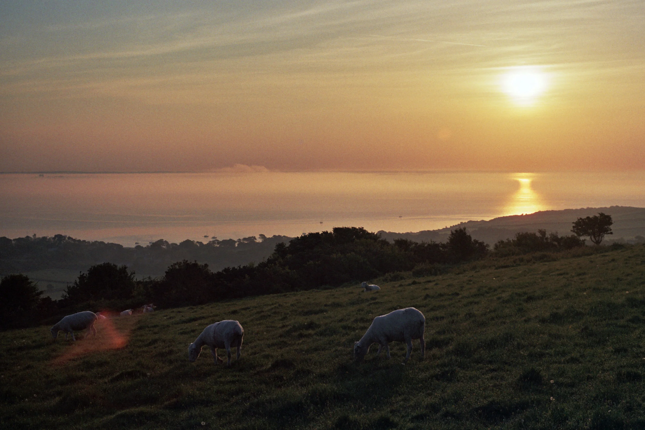 Sunrise walk up the hills and along the cliffs to..