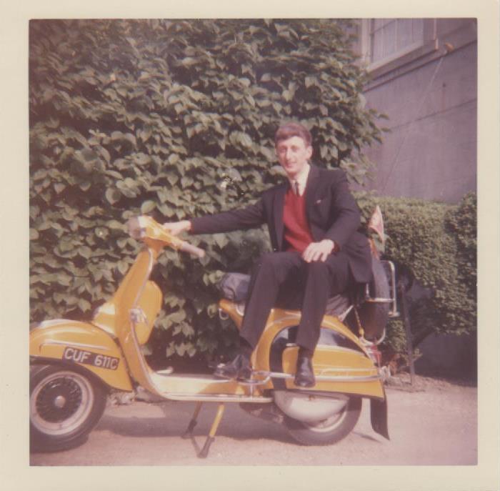 Nigel seated on his Vespa SS180