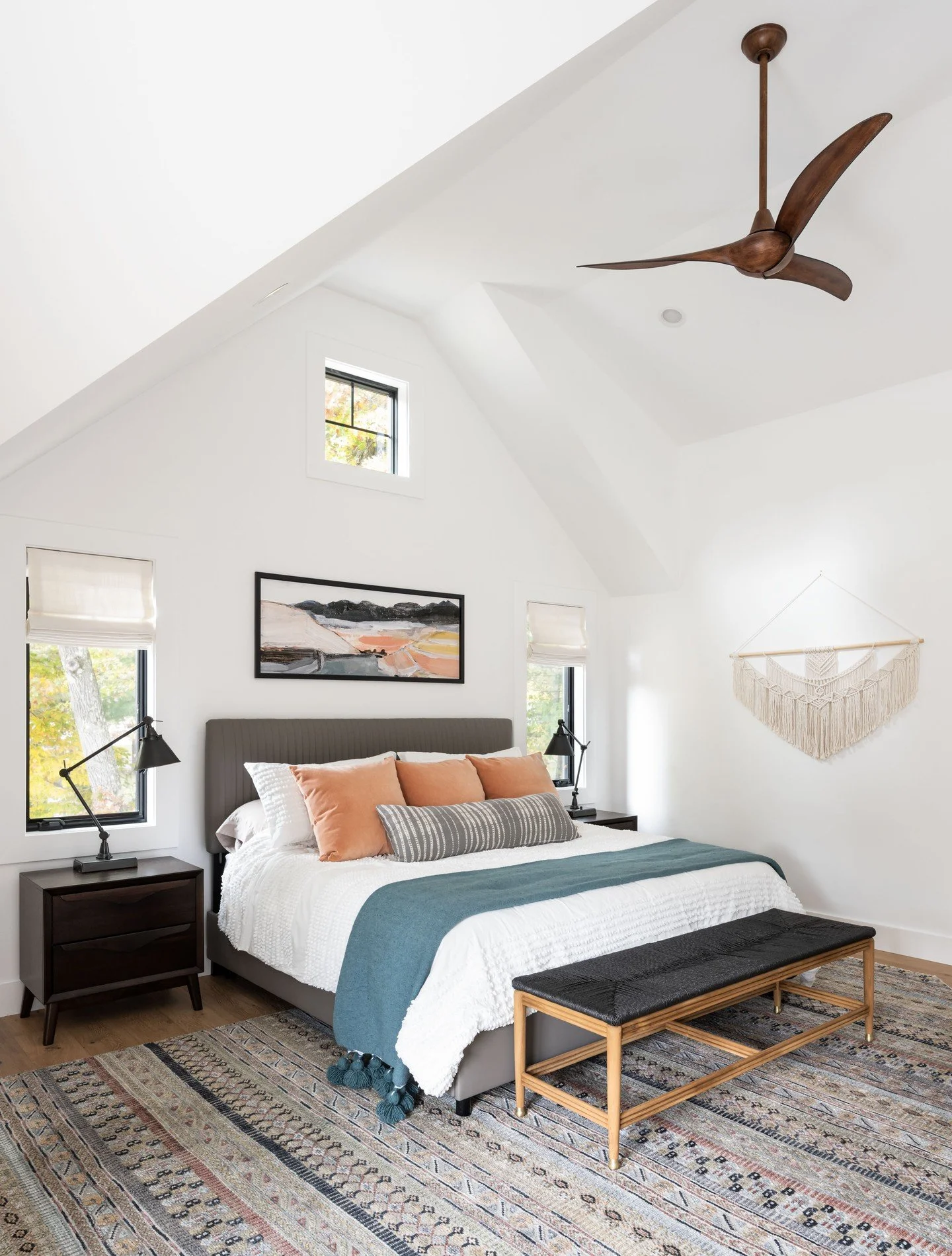 It always helps to soften tall spaces with tactile layers.  Here we added textures with a beautiful woven rug, macrame wall hanging and a tasseled throw.  Lightness with a touch of boho sure makes it easy to relax
 
@tamara_flanagan_photo with @fresh